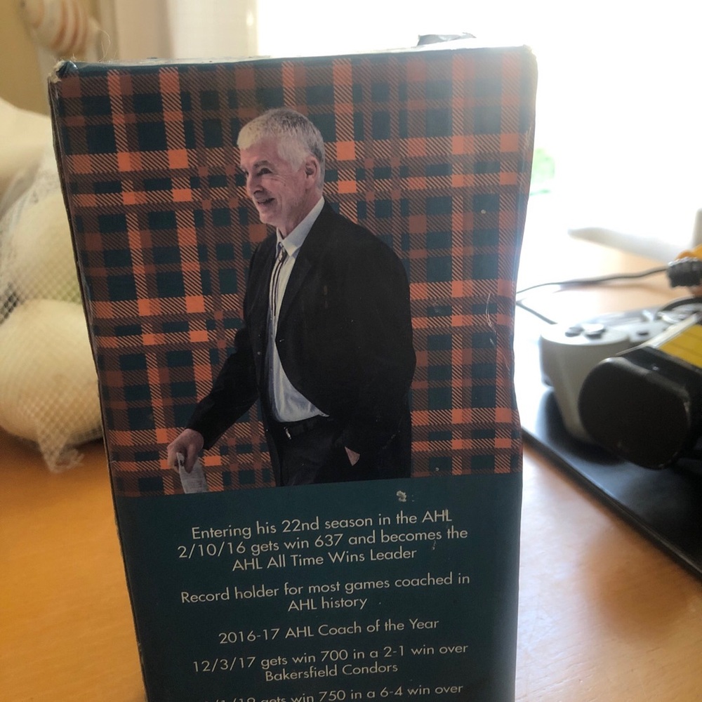 Collectible Sports Figure Box with Orange Plaid Backdrop